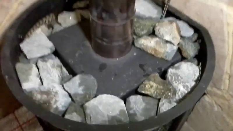 Как укладывать камни в банную печь везувий