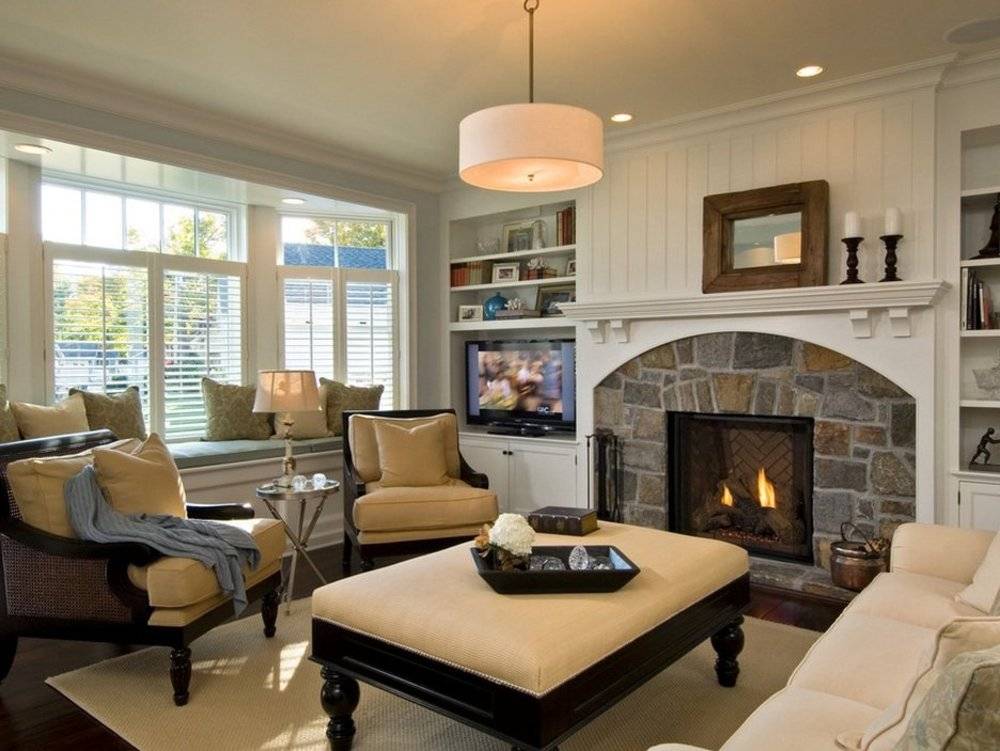 Гостиная с камином: современный стиль интерьера в частном доме с декоративным, белым или угловым биокамином и электрокамином
 - 61 фото