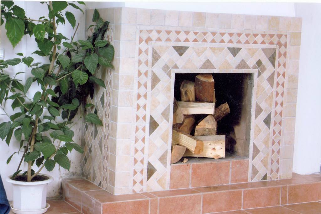Плитка терракот: керамические изделия для отделки печей и каминов